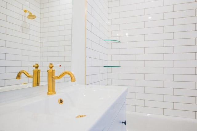 218 E S St, Fayetteville, AR 72701 - bathroom with vanity and tile walls