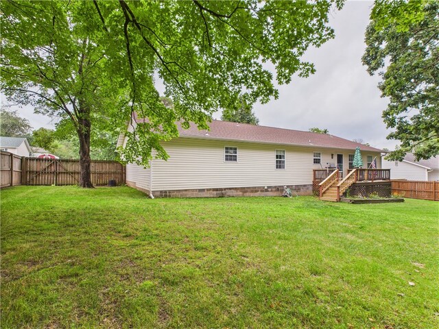 104 Paradise Cove Ln, Berryville, AR 72616 - rear view of property featuring a fenced backyard, a deck, crawl space, and stairs