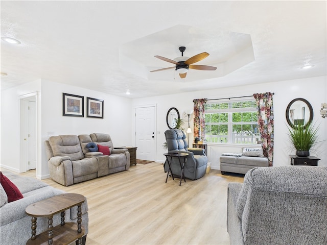 104 Paradise Cove Ln, Berryville, AR 72616 - living room with light wood-type flooring, a raised ceiling, ceiling fan, and recessed lighting