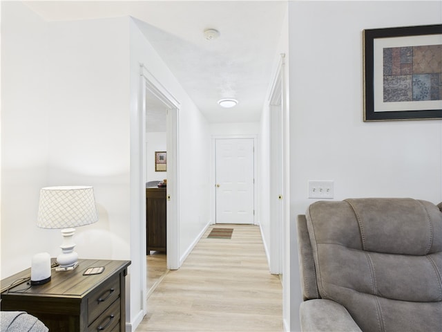 104 Paradise Cove Ln, Berryville, AR 72616 - hallway with light wood-style flooring and baseboards