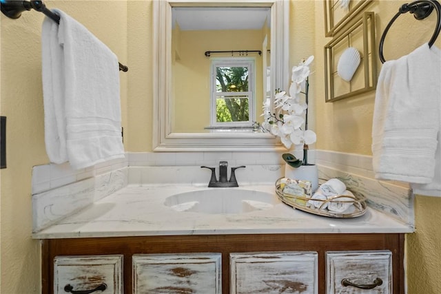 2511 Purdue Cir, Bentonville, AR 72712 - bathroom with vanity and a textured wall