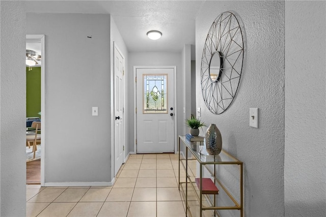 2511 Purdue Cir, Bentonville, AR 72712 - entrance foyer featuring light tile patterned floors and a textured wall