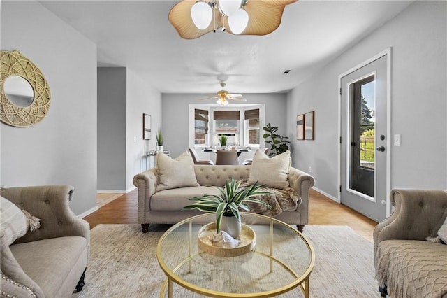 2511 Purdue Cir, Bentonville, AR 72712 - living area with ceiling fan and light wood finished floors