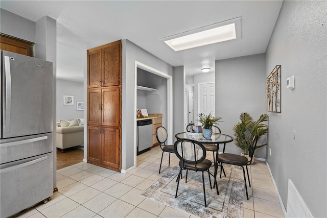 2511 Purdue Cir, Bentonville, AR 72712 - dining area featuring light tile patterned floors and baseboards
