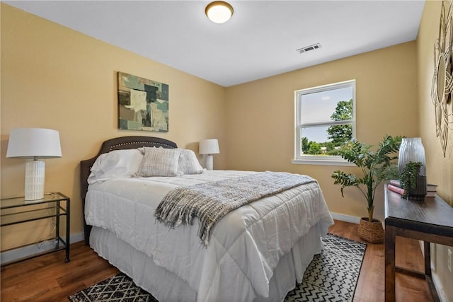 2511 Purdue Cir, Bentonville, AR 72712 - bedroom featuring wood finished floors and baseboards