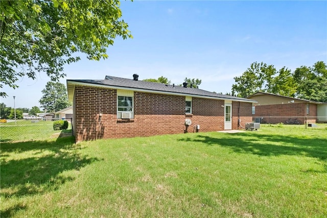 2511 Purdue Cir, Bentonville, AR 72712 - rear view of property featuring brick siding and cooling unit