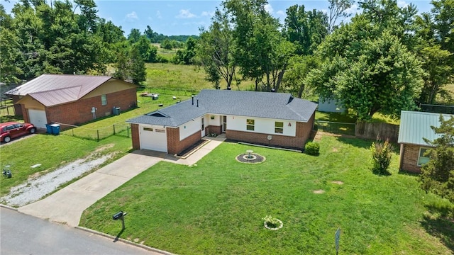2511 Purdue Cir, Bentonville, AR 72712 - view of front of home featuring concrete driveway, an attached garage, and brick siding