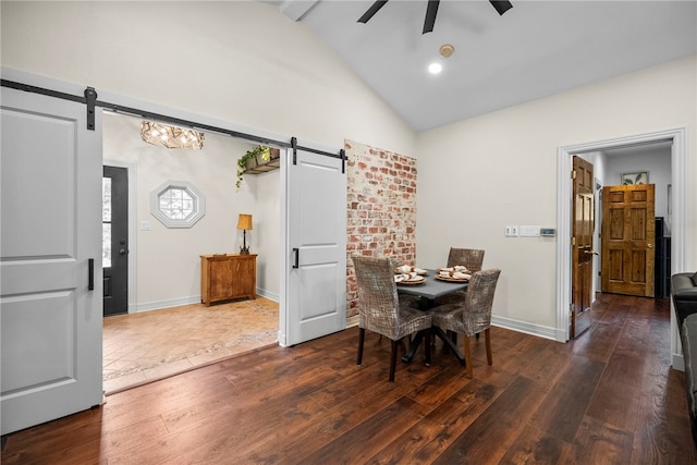 8252 Hickory Tree Ln, Rogers, AR 72756 - dining space featuring a barn door, ceiling fan, high vaulted ceiling, hardwood / wood-style flooring, and beam ceiling
