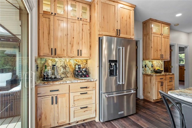 8252 Hickory Tree Ln, Rogers, AR 72756 - kitchen with high quality fridge, dark wood-style flooring, light brown cabinets, decorative backsplash, and glass insert cabinets