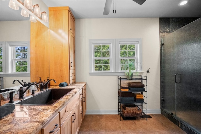 8252 Hickory Tree Ln, Rogers, AR 72756 - full bath with vanity, healthy amount of natural light, a stall shower, and tile patterned floors