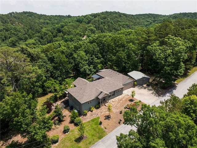 8252 Hickory Tree Ln, Rogers, AR 72756 - view of subject property with a heavily wooded area