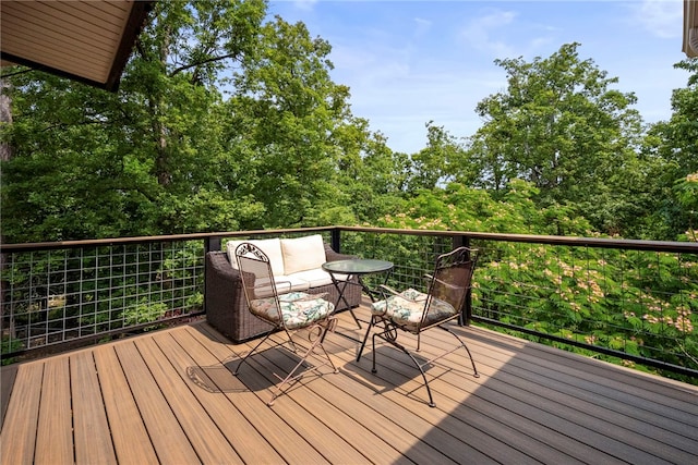 8252 Hickory Tree Ln, Rogers, AR 72756 - wooden deck with an outdoor living space