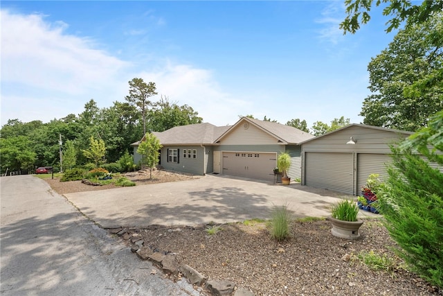 8252 Hickory Tree Ln, Rogers, AR 72756 - view of front facade with a garage and concrete driveway