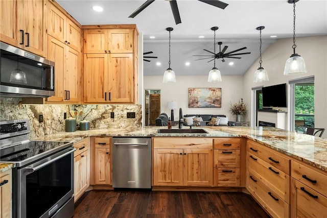 8252 Hickory Tree Ln, Rogers, AR 72756 - kitchen featuring stainless steel appliances, a ceiling fan, tasteful backsplash, dark wood-style flooring, and recessed lighting
