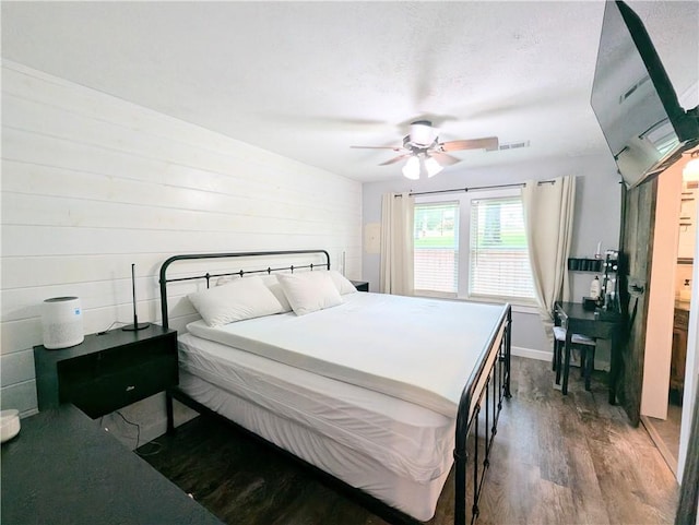 805 S Oak St, Harrison, AR 72601 - bedroom featuring wood finished floors and a ceiling fan