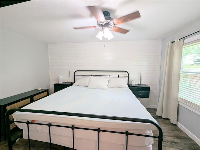 805 S Oak St, Harrison, AR 72601 - bedroom with dark wood-style floors and a ceiling fan