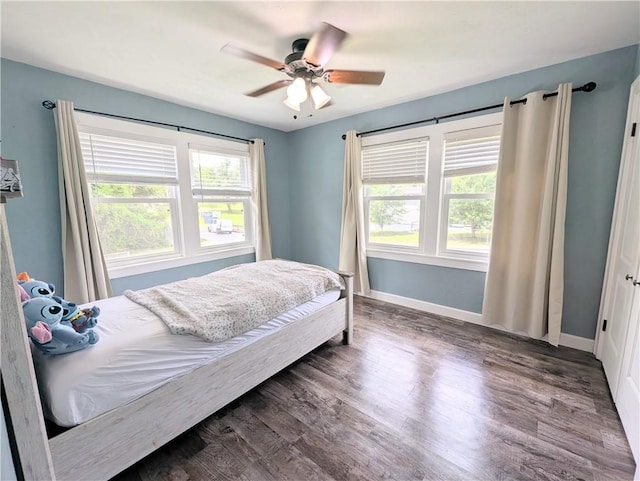 805 S Oak St, Harrison, AR 72601 - bedroom with wood finished floors and a ceiling fan
