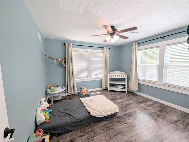 805 S Oak St, Harrison, AR 72601 - bedroom featuring wood finished floors and a ceiling fan