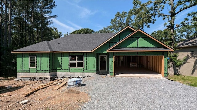 11 Dornoch Cir, Bella Vista, AR 72715 - property under construction with driveway and roof with shingles