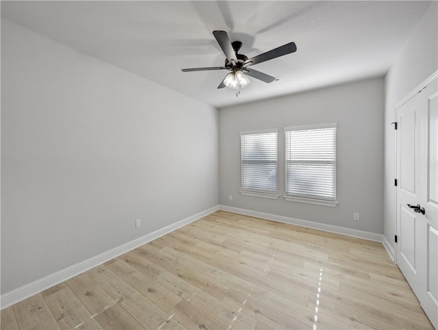 11 Dornoch Cir, Bella Vista, AR 72715 - empty room with a ceiling fan and light wood-type flooring