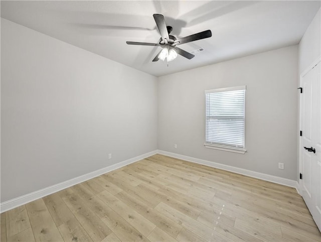11 Dornoch Cir, Bella Vista, AR 72715 - unfurnished room featuring light wood-style flooring and a ceiling fan