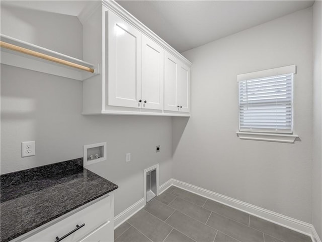 11 Dornoch Cir, Bella Vista, AR 72715 - laundry room featuring cabinet space, hookup for a washing machine, hookup for an electric dryer, and tile patterned floors