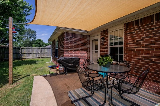 1041 Evergreen St, Centerton, AR 72719 - view of patio / terrace featuring grilling area and outdoor dining space