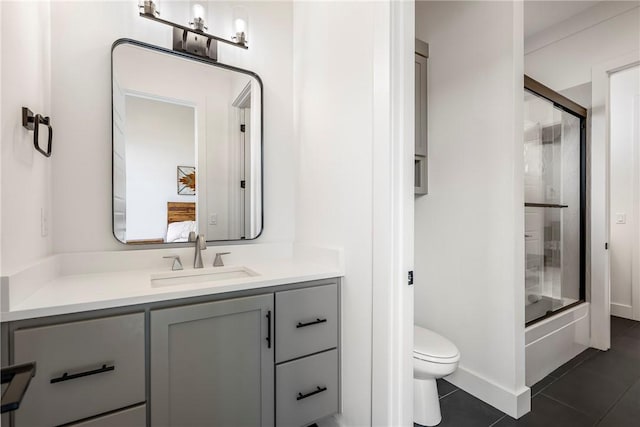 8002 W Claverton St, Rogers, AR 72758 - full bath featuring tile patterned floors, vanity, and bath / shower combo with glass door