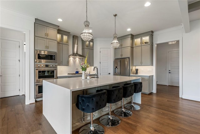 8002 W Claverton St, Rogers, AR 72758 - kitchen with wall chimney exhaust hood, stainless steel appliances, gray cabinets, recessed lighting, and decorative backsplash