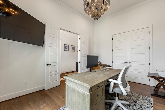 8002 W Claverton St, Rogers, AR 72758 - office area with wood finished floors, ornamental molding, and a chandelier