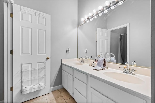 6629 Tall Oaks Loop, Springdale, AR 72762 - bathroom with double vanity and tile patterned flooring