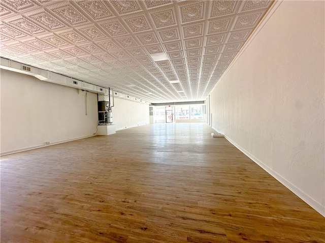 108 Public Sq, Berryville, AR 72616 - empty room featuring an ornate ceiling and wood finished floors
