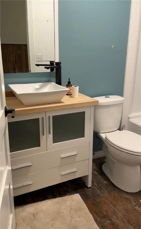 108 Public Sq, Berryville, AR 72616 - bathroom featuring vanity and hardwood / wood-style floors