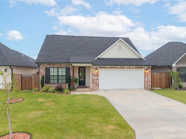 9116 Kirkwood Rdg, Fort Smith, AR 72916 - view of front facade featuring brick siding, an attached garage, concrete driveway, board and batten siding, and roof with shingles