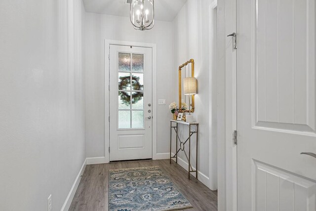 9116 Kirkwood Rdg, Fort Smith, AR 72916 - doorway featuring a chandelier and wood finished floors