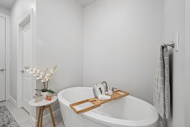 9116 Kirkwood Rdg, Fort Smith, AR 72916 - bathroom with a soaking tub and tile patterned floors