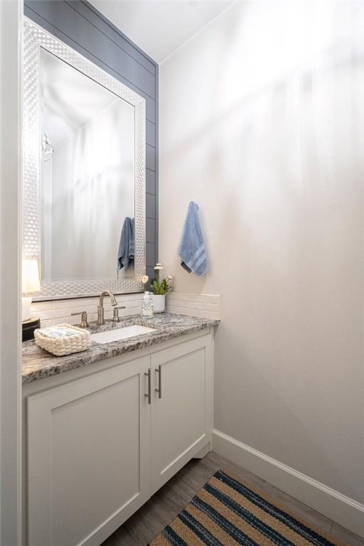 9116 Kirkwood Rdg, Fort Smith, AR 72916 - bathroom with vanity and wood finished floors