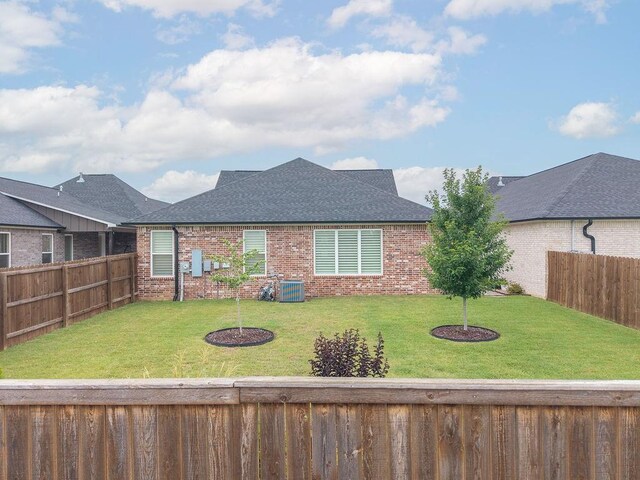 9116 Kirkwood Rdg, Fort Smith, AR 72916 - view of front of property with a fenced backyard, brick siding, and roof with shingles