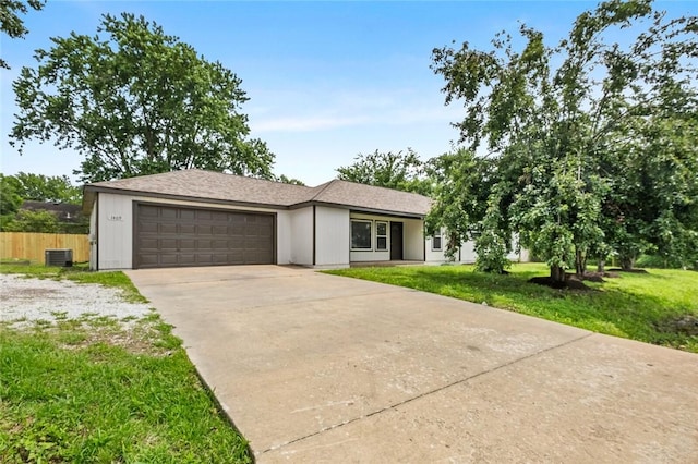 1409 N Arkansas St, Rogers, AR 72756 - view of front of home with an attached garage and concrete driveway
