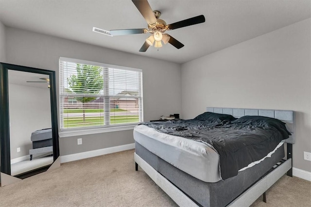 328 N Otoe St, Farmington, AR 72730 - carpeted bedroom featuring baseboards and ceiling fan