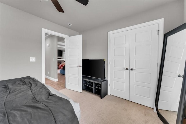 328 N Otoe St, Farmington, AR 72730 - bedroom featuring light carpet, a closet, and a ceiling fan