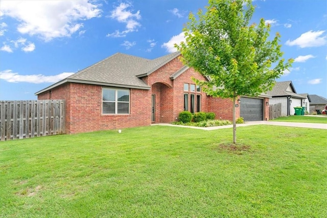 328 N Otoe St, Farmington, AR 72730 - view of front of house featuring brick siding, concrete driveway, an attached garage, and roof with shingles