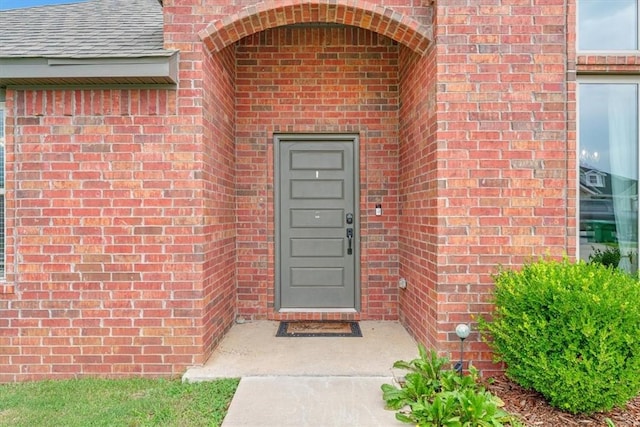 328 N Otoe St, Farmington, AR 72730 - view of exterior entry featuring brick siding