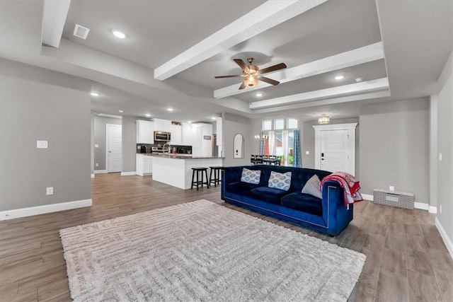 328 N Otoe St, Farmington, AR 72730 - living area featuring light wood-style flooring, a ceiling fan, recessed lighting, and a tray ceiling