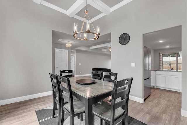 328 N Otoe St, Farmington, AR 72730 - dining room with light wood-style flooring, a chandelier, coffered ceiling, ceiling fan, and beam ceiling