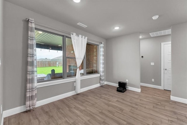 328 N Otoe St, Farmington, AR 72730 - unfurnished room featuring wood finished floors, a smoke detector, and recessed lighting