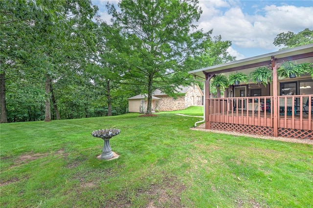 8553 Stoner Ln, Rogers, AR 72756 - view of green lawn featuring a wooden deck