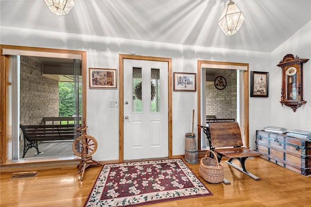 8553 Stoner Ln, Rogers, AR 72756 - foyer featuring wood finished floors and baseboards