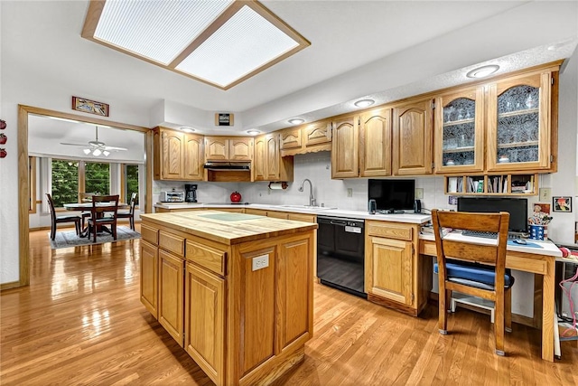 8553 Stoner Ln, Rogers, AR 72756 - kitchen featuring black dishwasher, butcher block countertops, light wood-style flooring, and decorative backsplash