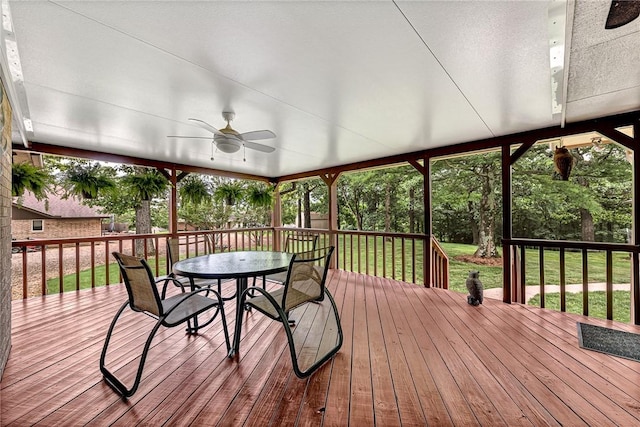 8553 Stoner Ln, Rogers, AR 72756 - sunroom featuring a ceiling fan and outdoor dining area